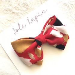 Crossed red&gold bow
