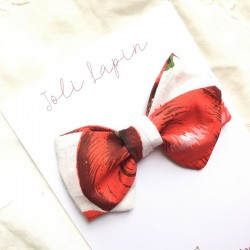 Crossed fruity red bow