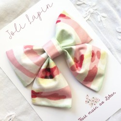Big green and red striped bows