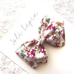Crossed white fall floral bow