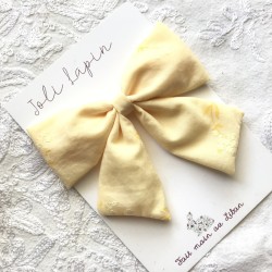 Big pastel yellow floral bow