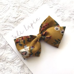 Crossed floral mustard bow