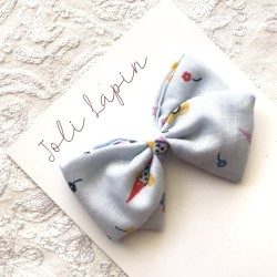 Crossed blue circus bow