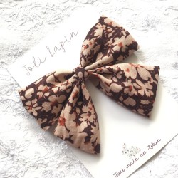 Big floral brown bow...