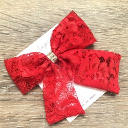 Big gold and red lace bow