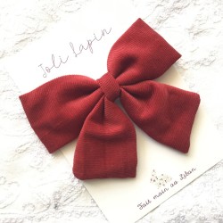 Big red corduroy bow...