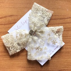 Big festive gold lace bow