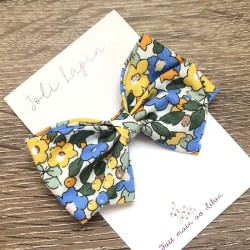 Crossed yellow liberty bow